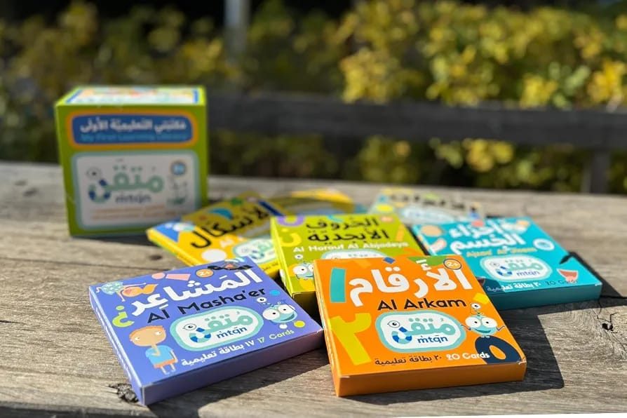 The Moutqan flashcard decks fanned out in bright colours